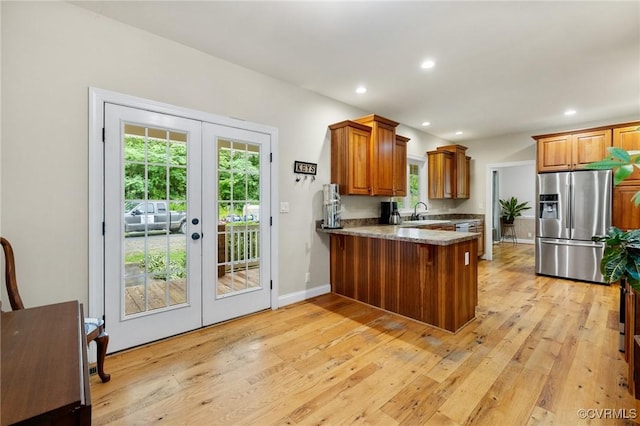 11021 Grub Hill Church Rd, Amelia Courthouse, VA 23002 - kitchen featuring stainless steel refrigerator with ice dispenser, french doors, a peninsula, healthy amount of natural light, and recessed lighting