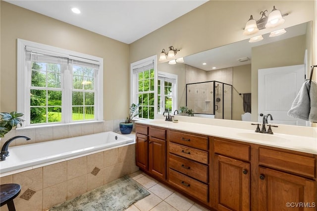 11021 Grub Hill Church Rd, Amelia Courthouse, VA 23002 - full bath with double vanity, a stall shower, tile patterned flooring, and a bath