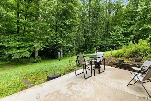 11021 Grub Hill Church Rd, Amelia Courthouse, VA 23002 - view of patio with outdoor dining area and a wooded view