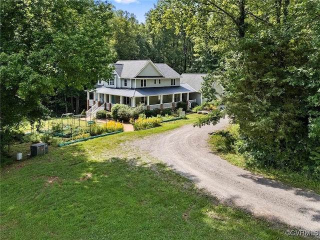 11021 Grub Hill Church Rd, Amelia Courthouse, VA 23002 - farmhouse inspired home featuring curved driveway, a front lawn, and a view of trees