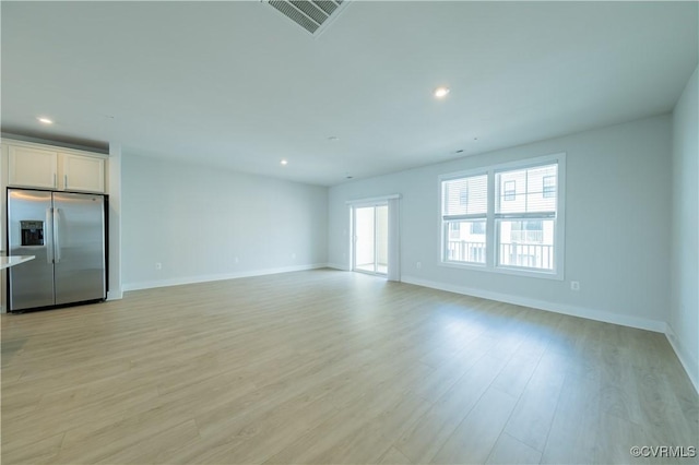 4302 Weaver Brook Rd Unit B, Glen Allen, VA 23233 - unfurnished living room featuring light wood-style floors, baseboards, and recessed lighting