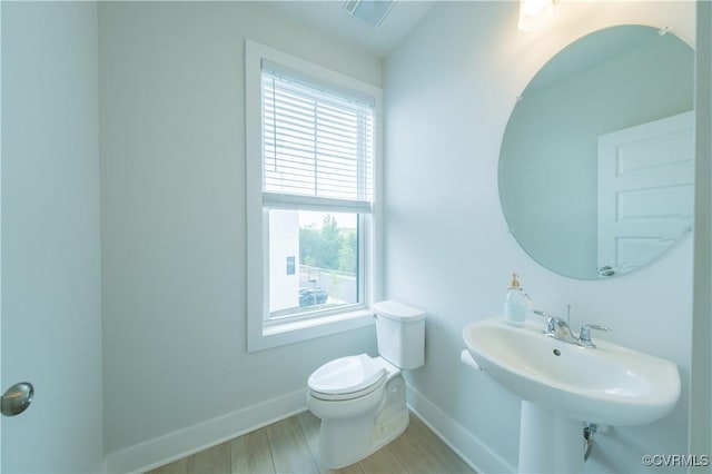 4302 Weaver Brook Rd Unit B, Glen Allen, VA 23233 - bathroom with baseboards, toilet, and wood finished floors