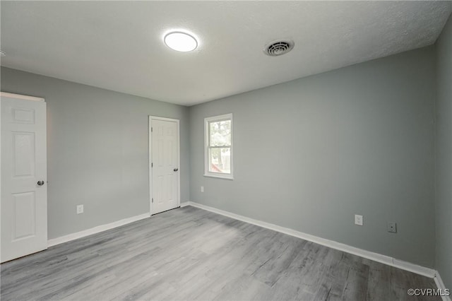 2533 Merle St, Henrico, VA 23231 - spare room with wood finished floors and baseboards