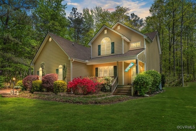 2024 Judes Ferry Rd, Powhatan, VA 23139 - traditional-style house featuring covered porch, a front yard, and a shingled roof