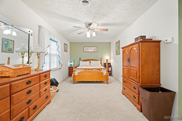 2024 Judes Ferry Rd, Powhatan, VA 23139 - bedroom featuring light colored carpet, a textured ceiling, and a ceiling fan