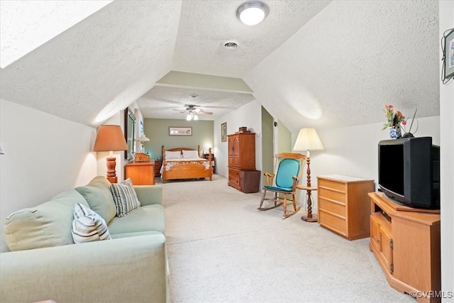 2024 Judes Ferry Rd, Powhatan, VA 23139 - bedroom with a textured ceiling, light carpet, vaulted ceiling, and ceiling fan