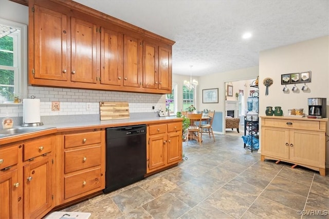 2024 Judes Ferry Rd, Powhatan, VA 23139 - kitchen featuring black dishwasher, tasteful backsplash, a chandelier, baseboards, and light countertops