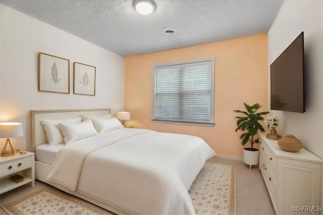 2024 Judes Ferry Rd, Powhatan, VA 23139 - bedroom featuring a textured ceiling and light colored carpet