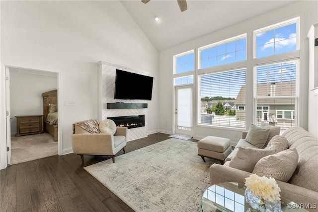 4025 Carrie Mill Xing, Glen Allen, VA 23059 - living room featuring high vaulted ceiling, dark wood-style floors, ceiling fan, a glass covered fireplace, and recessed lighting