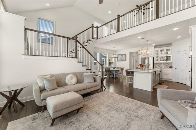 4025 Carrie Mill Xing, Glen Allen, VA 23059 - living room with a chandelier, stairway, dark wood finished floors, high vaulted ceiling, and recessed lighting