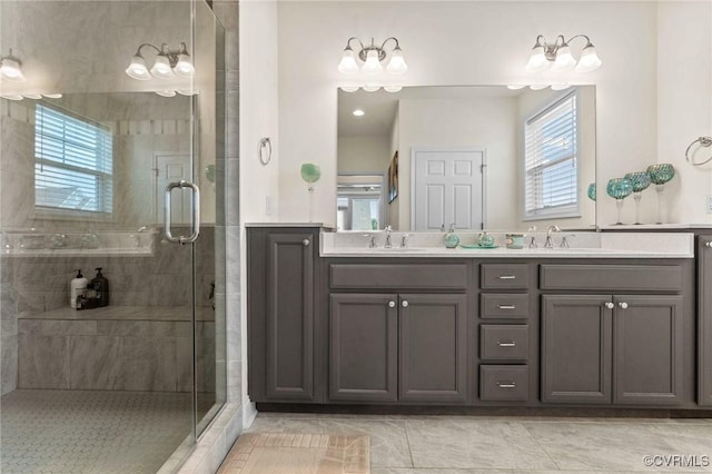 4025 Carrie Mill Xing, Glen Allen, VA 23059 - bathroom with healthy amount of natural light, a stall shower, double vanity, and tile patterned floors