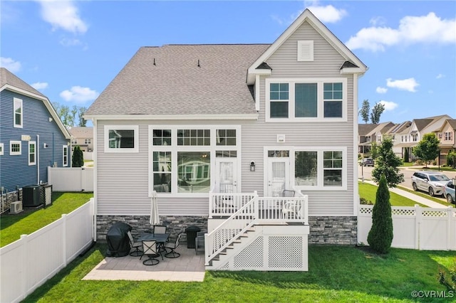 4025 Carrie Mill Xing, Glen Allen, VA 23059 - back of house with a patio, a fenced backyard, a shingled roof, and a residential view