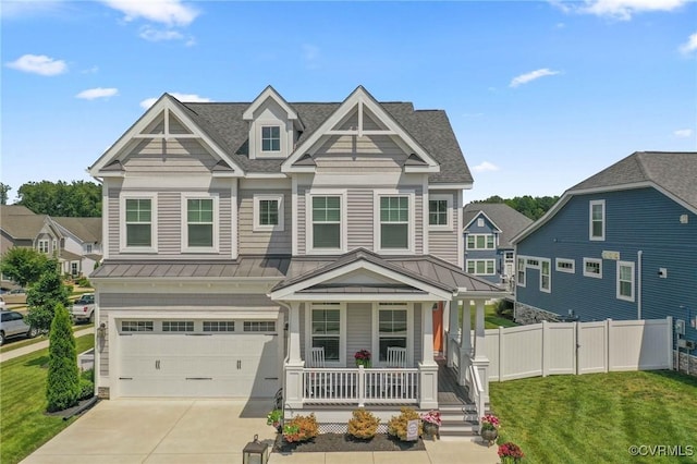 4025 Carrie Mill Xing, Glen Allen, VA 23059 - craftsman-style house featuring a porch, a standing seam roof, a garage, a metal roof, and driveway