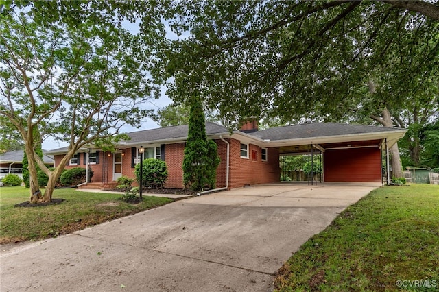 3304 Walnut St, Hopewell, VA 23860 - single story home with concrete driveway, a front yard, brick siding, a carport, and a chimney