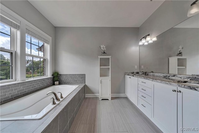 5217 Aldenbrook Way, Henrico, VA 23059 - full bathroom featuring double vanity, a bath, and baseboards