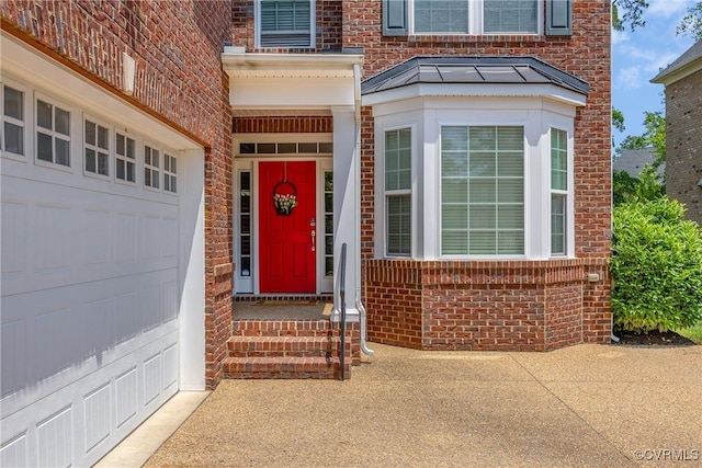 5217 Aldenbrook Way, Henrico, VA 23059 - view of exterior entry featuring brick siding and a garage