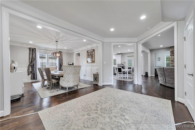 5217 Aldenbrook Way, Henrico, VA 23059 - dining area with dark wood finished floors, crown molding, and a chandelier