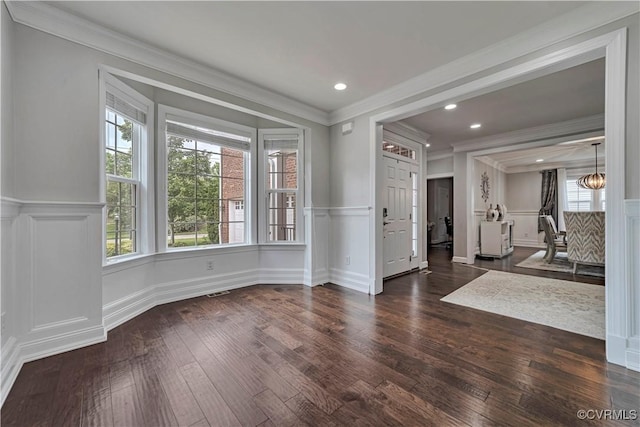 5217 Aldenbrook Way, Henrico, VA 23059 - empty room with a decorative wall, ornamental molding, wood finished floors, a wainscoted wall, and a chandelier