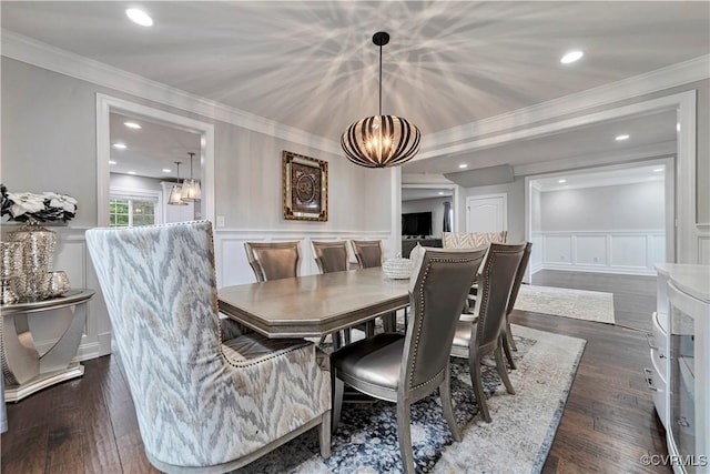 5217 Aldenbrook Way, Henrico, VA 23059 - dining space featuring a decorative wall, a chandelier, crown molding, dark wood finished floors, and a wainscoted wall