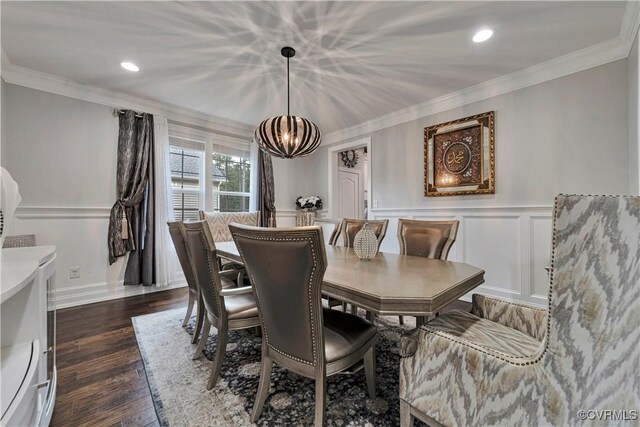 5217 Aldenbrook Way, Henrico, VA 23059 - dining room with a chandelier, a decorative wall, dark wood-style flooring, ornamental molding, and wainscoting