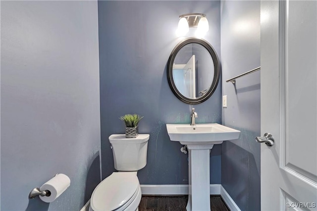 5217 Aldenbrook Way, Henrico, VA 23059 - bathroom featuring toilet, baseboards, and wood finished floors