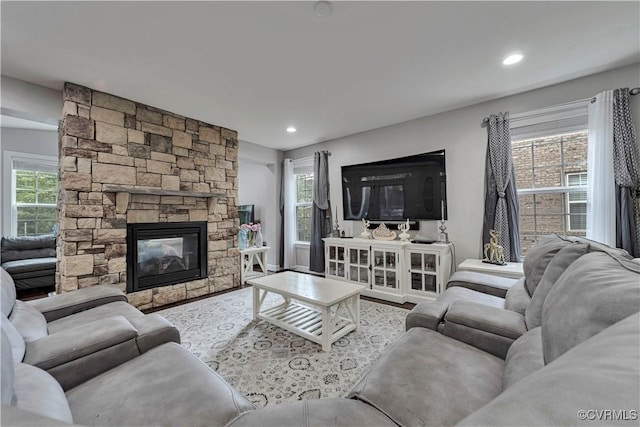 5217 Aldenbrook Way, Henrico, VA 23059 - living room featuring wood finished floors, a stone fireplace, recessed lighting, and baseboards