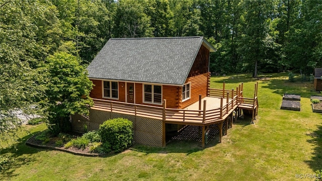 4285 Hadensville Farm Rd, Goochland, VA 23117 - view of home's exterior with log exterior, a wooden deck, a lawn, a shingled roof, and a wooded view
