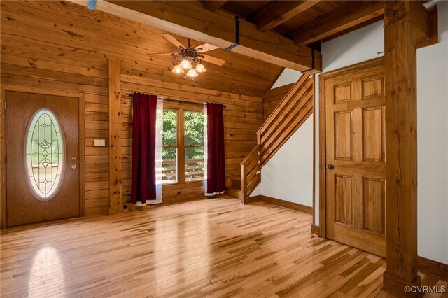 4285 Hadensville Farm Rd, Goochland, VA 23117 - foyer entrance featuring stairs, ceiling fan, light wood-type flooring, wooden walls, and wooden ceiling