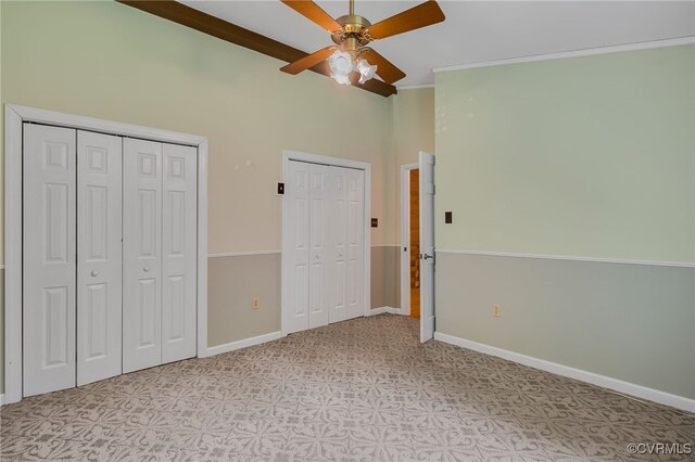 4285 Hadensville Farm Rd, Goochland, VA 23117 - unfurnished bedroom with multiple closets, light floors, ornamental molding, a high ceiling, and ceiling fan