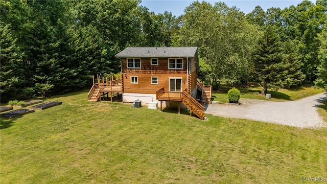 4285 Hadensville Farm Rd, Goochland, VA 23117 - back of property with stairs, a lawn, and a wooden deck