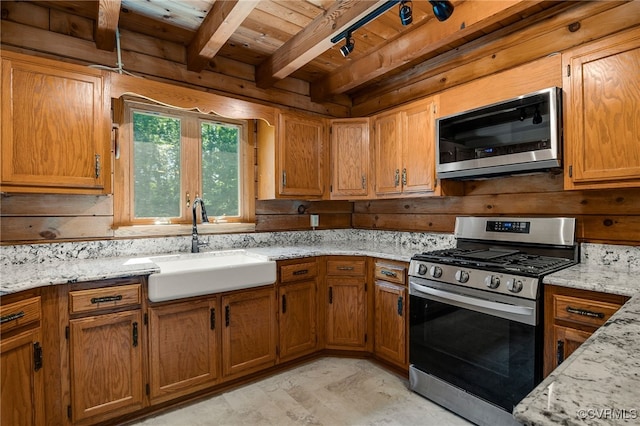 4285 Hadensville Farm Rd, Goochland, VA 23117 - kitchen featuring stainless steel appliances, a wooden ceiling with exposed beams, brown cabinets, and light stone countertops