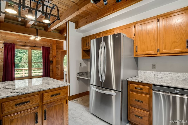 4285 Hadensville Farm Rd, Goochland, VA 23117 - kitchen featuring stainless steel appliances, a wood ceiling with exposed beams, wooden walls, brown cabinets, and light stone counters