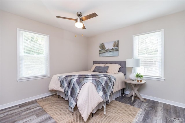 5007 Gention Rd, Chesterfield, VA 23832 - bedroom with multiple windows, wood finished floors, and baseboards