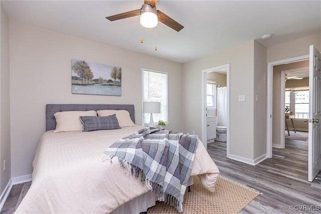 5007 Gention Rd, Chesterfield, VA 23832 - bedroom featuring wood finished floors, baseboards, and connected bathroom