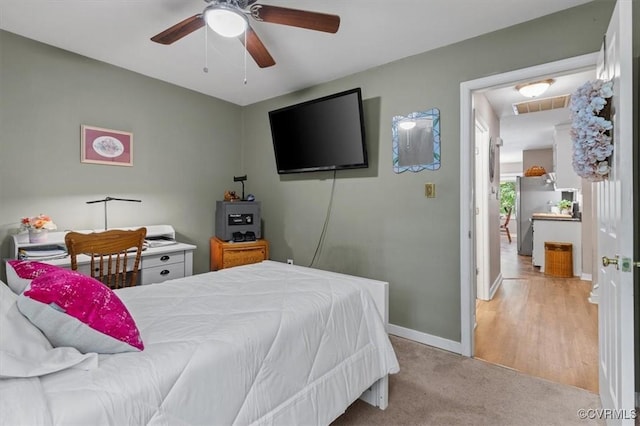 7503 Native Dancer Dr, Midlothian, VA 23112 - bedroom featuring baseboards, freestanding refrigerator, ceiling fan, and carpet