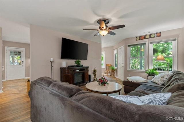 7503 Native Dancer Dr, Midlothian, VA 23112 - living area featuring a ceiling fan, plenty of natural light, baseboards, and light wood-style floors