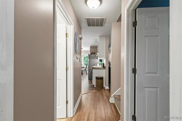 7503 Native Dancer Dr, Midlothian, VA 23112 - hall with light wood finished floors and baseboards