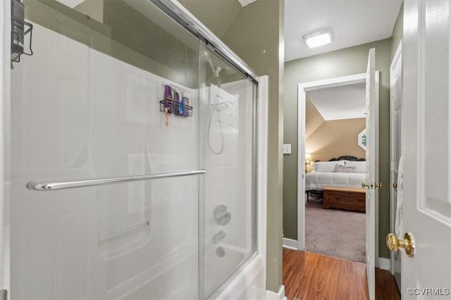 7503 Native Dancer Dr, Midlothian, VA 23112 - ensuite bathroom featuring wood finished floors, shower / bath combination with glass door, and baseboards