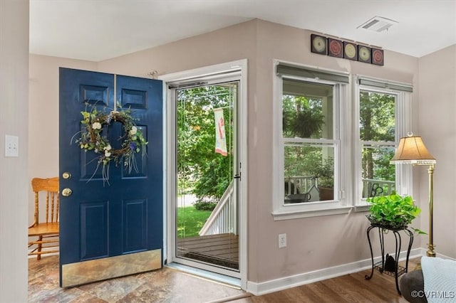 7503 Native Dancer Dr, Midlothian, VA 23112 - entryway with plenty of natural light, baseboards, and wood finished floors