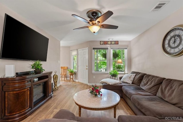 7503 Native Dancer Dr, Midlothian, VA 23112 - living area with light wood-type flooring, a ceiling fan, and baseboards