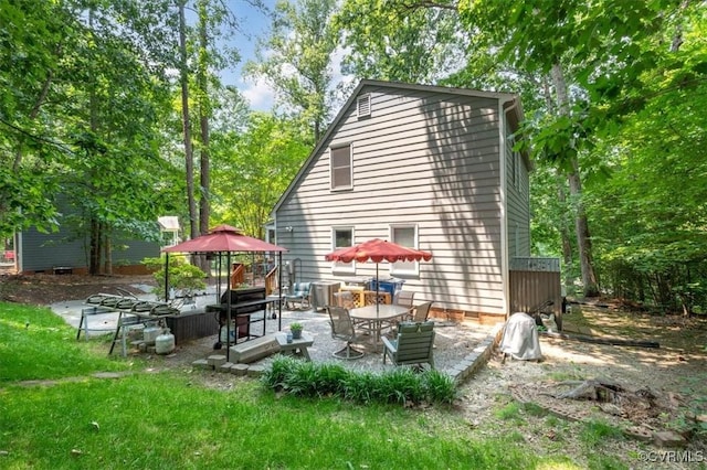 7503 Native Dancer Dr, Midlothian, VA 23112 - rear view of house with a patio and a yard