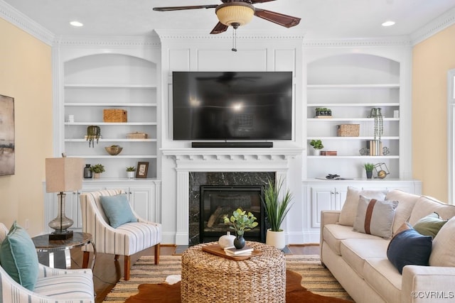 12316 Traylor Field Ln, Ashland, VA 23005 - living area with built in shelves, ceiling fan, wood finished floors, ornamental molding, and recessed lighting
