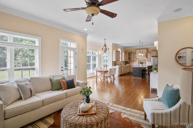 12316 Traylor Field Ln, Ashland, VA 23005 - living room featuring crown molding, wood finished floors, ceiling fan, a chandelier, and recessed lighting