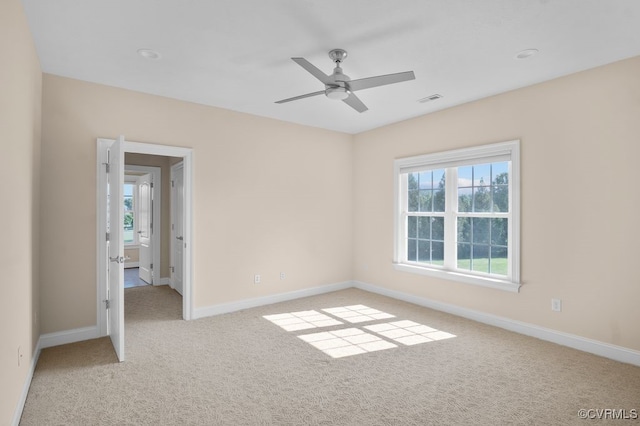 12316 Traylor Field Ln, Ashland, VA 23005 - empty room with light carpet, baseboards, and a ceiling fan