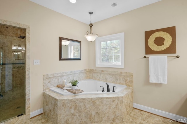12316 Traylor Field Ln, Ashland, VA 23005 - bathroom with a bath, a stall shower, and baseboards