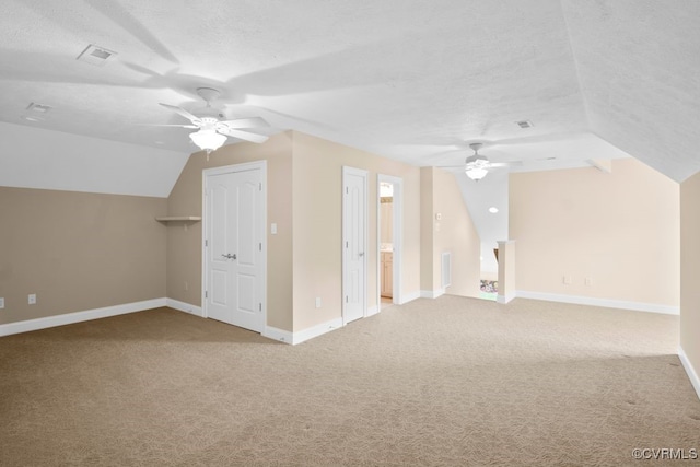12316 Traylor Field Ln, Ashland, VA 23005 - additional living space with a ceiling fan, vaulted ceiling, a textured ceiling, carpet floors, and baseboards