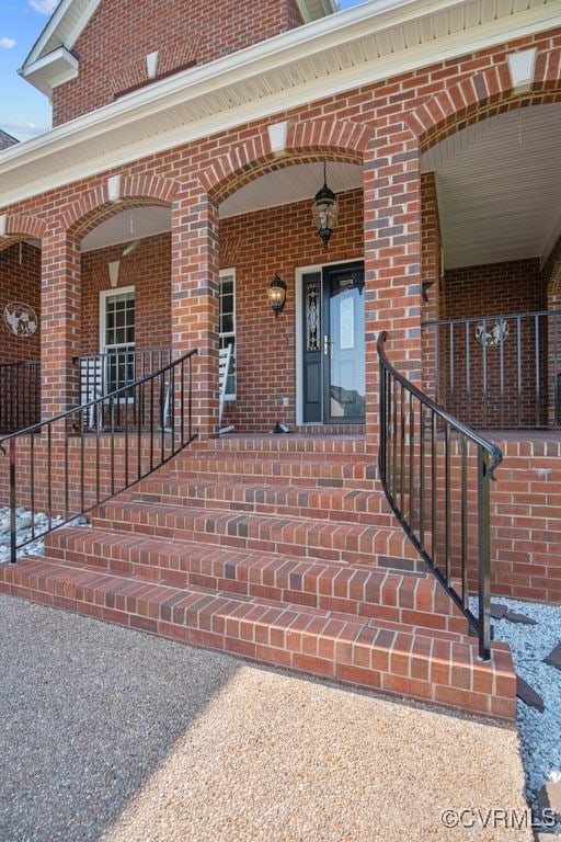 12316 Traylor Field Ln, Ashland, VA 23005 - entrance to property with covered porch and brick siding