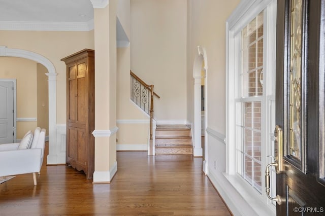 12316 Traylor Field Ln, Ashland, VA 23005 - entryway with arched walkways, wood finished floors, stairway, and ornamental molding