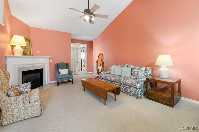 9401 Nolandwood Dr, Mechanicsville, VA 23116 - carpeted living area with a ceiling fan, baseboards, a glass covered fireplace, and high vaulted ceiling