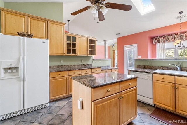 9401 Nolandwood Dr, Mechanicsville, VA 23116 - kitchen featuring white appliances, a sink, vaulted ceiling, ceiling fan, and a skylight